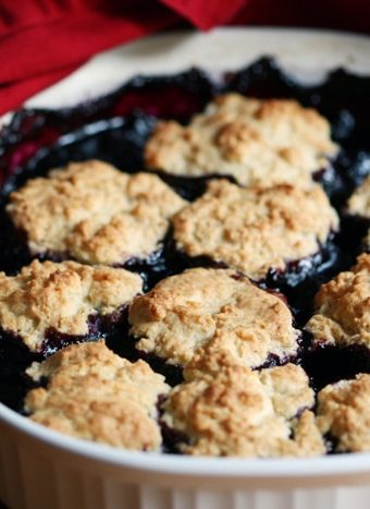 blueberry cherry cobbler in baking dish