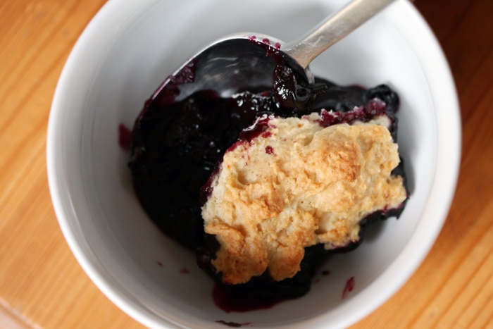 bowl with serving of blueberry cherry cobbler