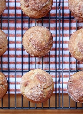 cider doughnut muffins on a cooling rack