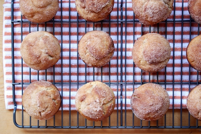 cider doughnut muffins on a cooling rack