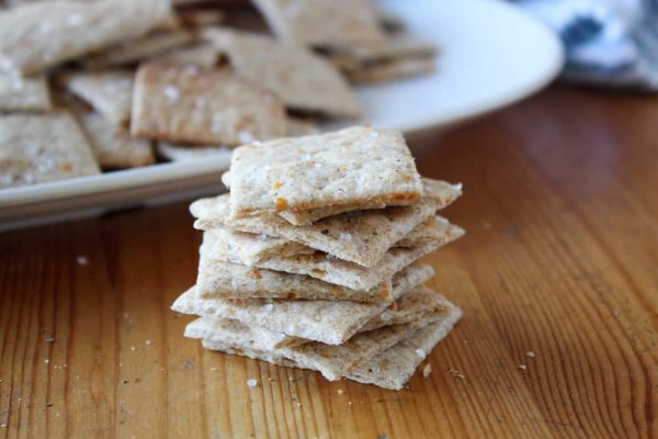 stack of parmesan sea salt and pepper crackers.