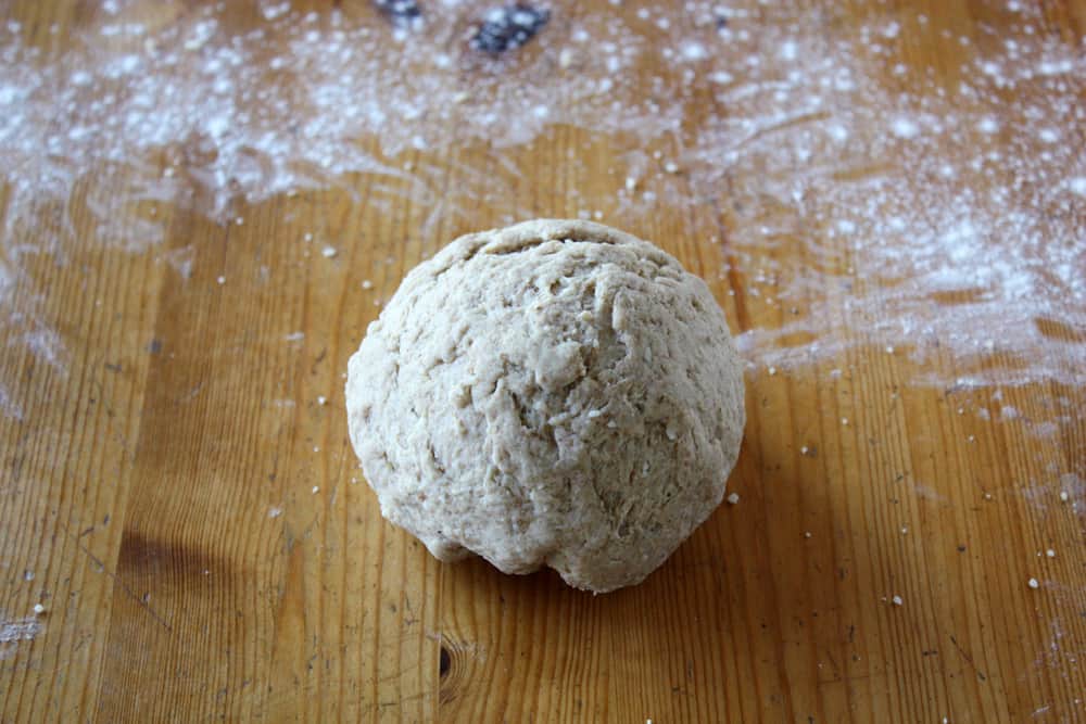 cracker dough ball on cutting board
