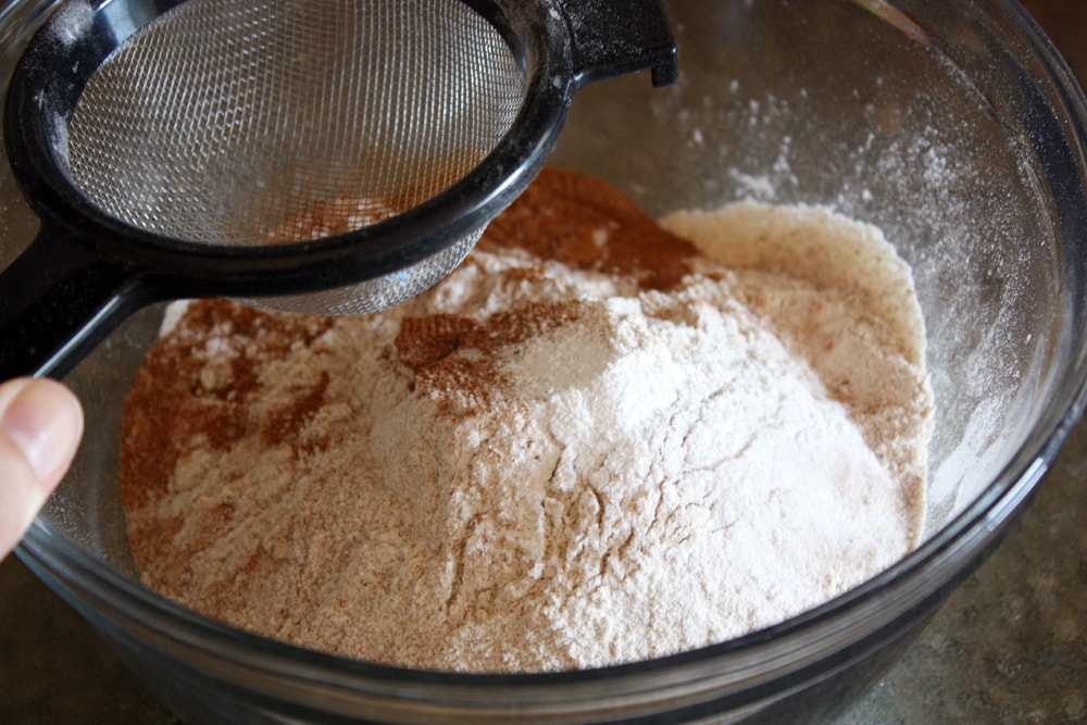 adding ingredients in mixing bowl