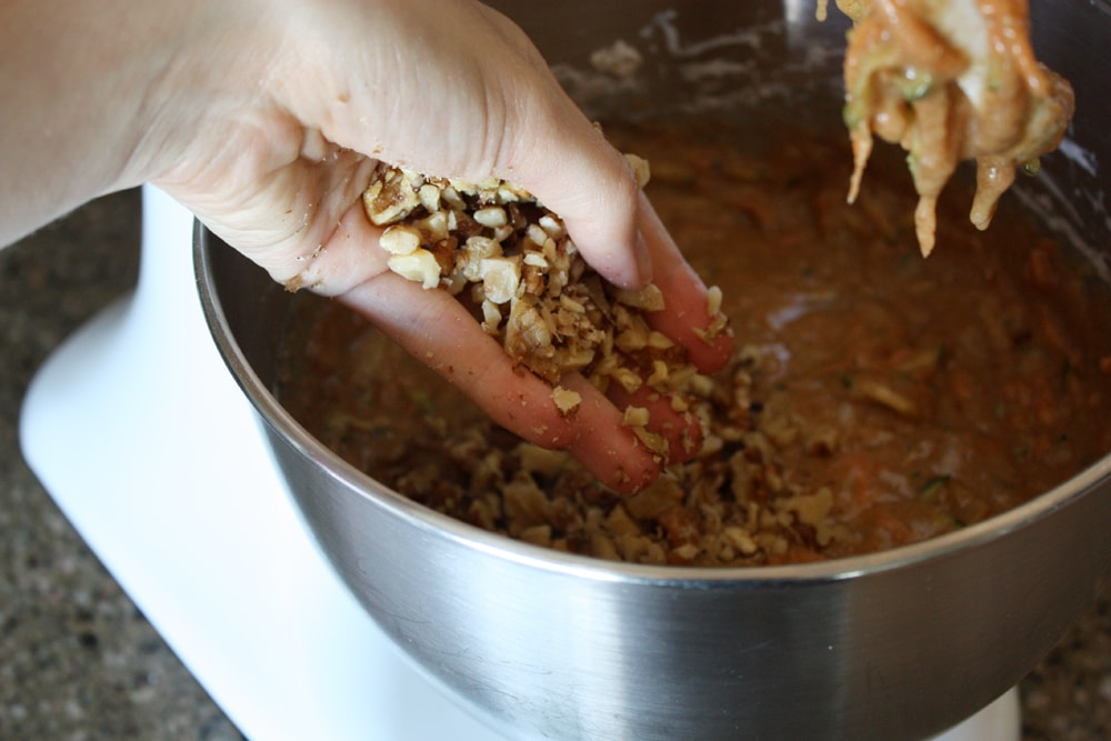 adding ingredients to mixing bowl