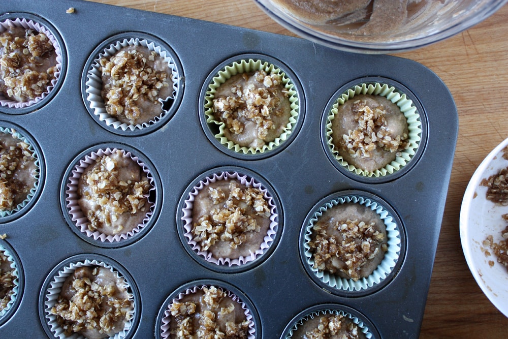 caramel pear muffin batter in muffin pan