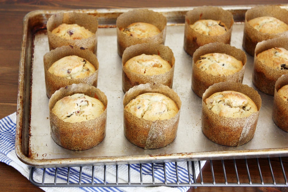 baked panettone muffins on baking sheet