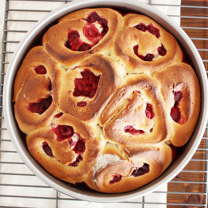 baked raspberry sweet rolls in pan not iced.