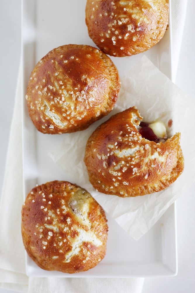 brie pretzel hand pies on plate