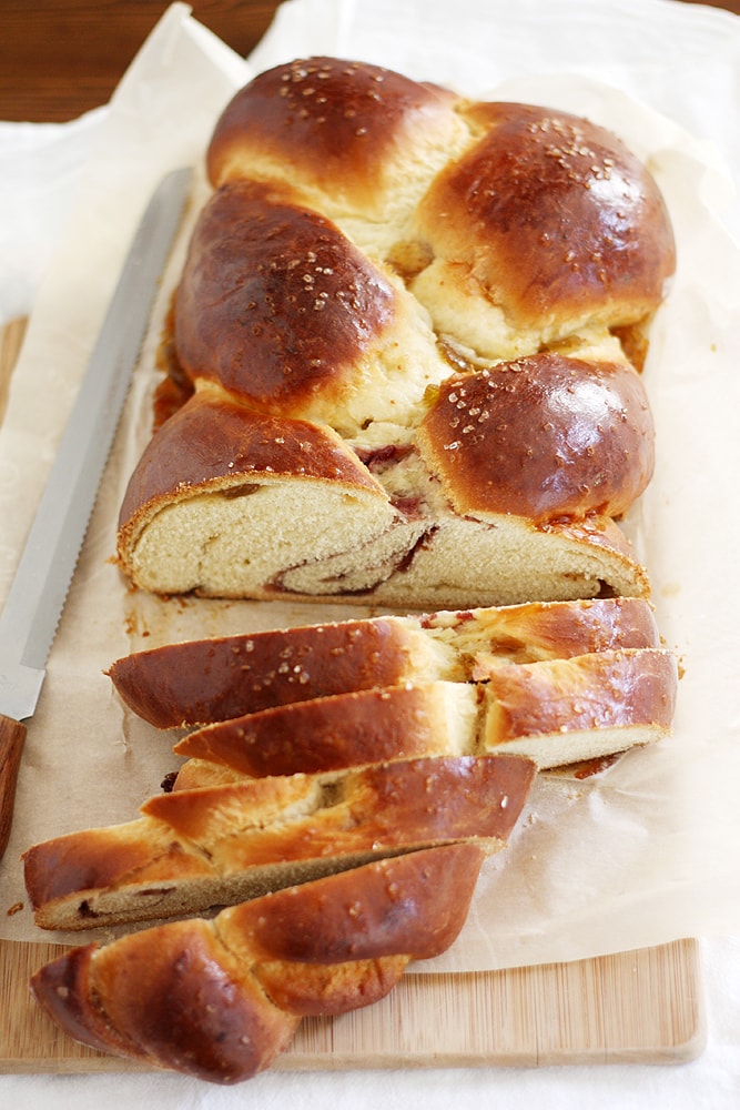 fig raspberry and sea salt challah bread on cutting board