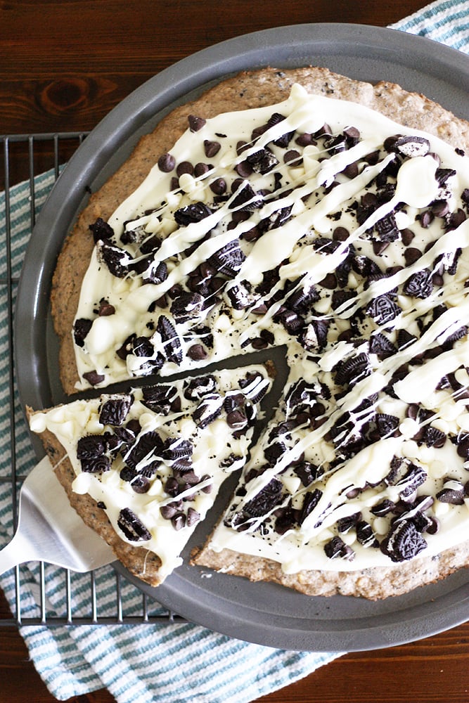 cookies and creme dessert pizza on a baking pan