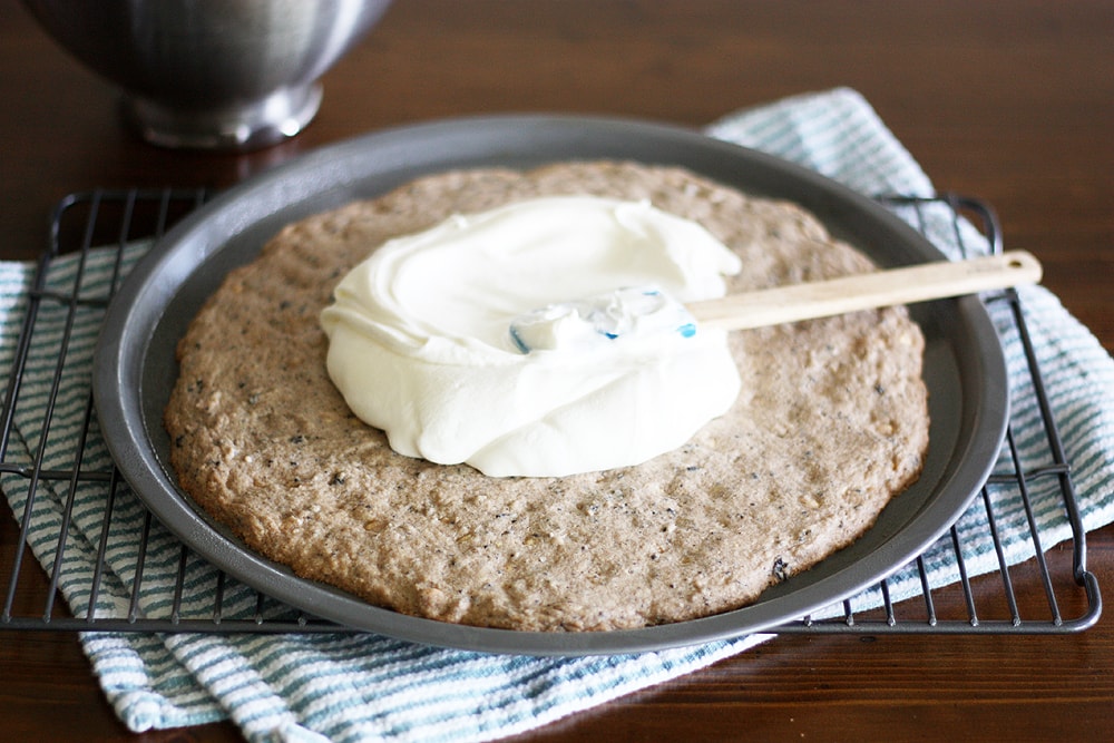 spreading cream filling on dessert pizza dough