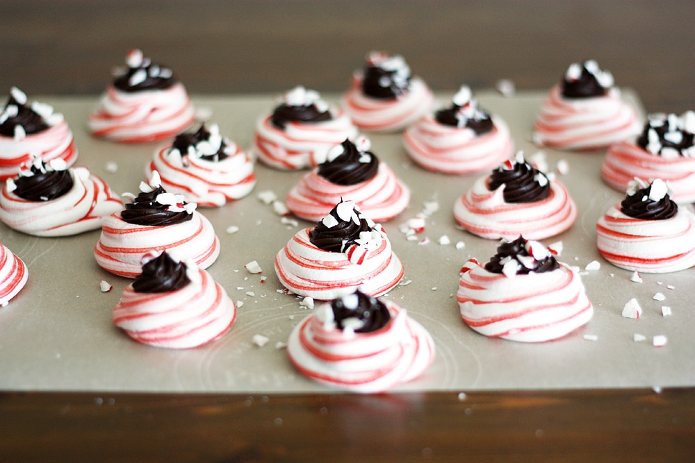 dark chocolate peppermint meringues on parchment paper