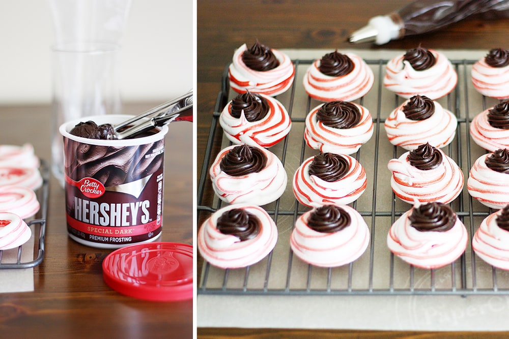 putting dark chocolate on the peppermint meringues