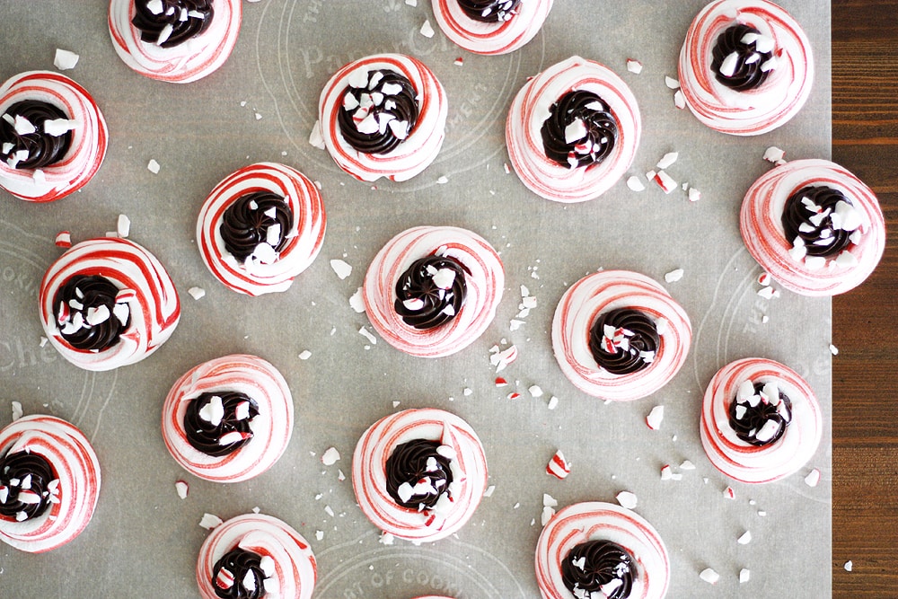 dark chocolate peppermint meringues on parchment paper