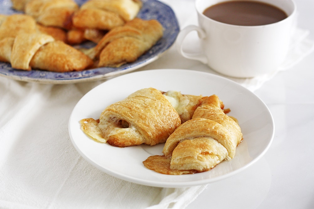 brown butter apple cheddar pie crescent rolls on plate