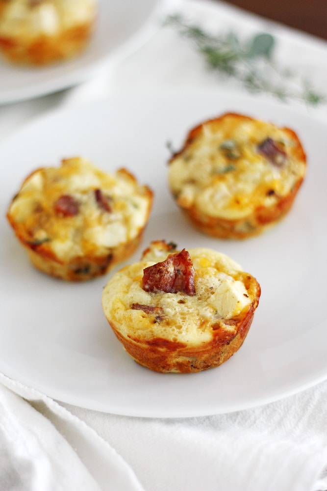 apple bacon cheddar breakfast pies on plate