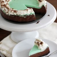double chocolate mint cheesecake on cake stand