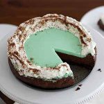 double chocolate mint cheesecake on stand.