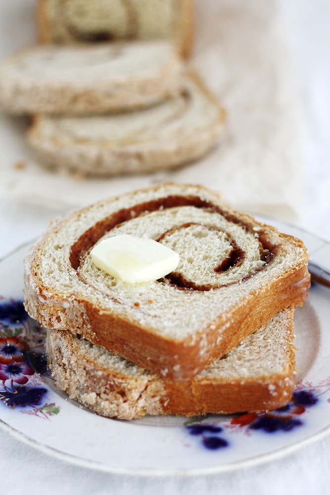 pat of butter on slice of eggnog cinnamon swirl bread