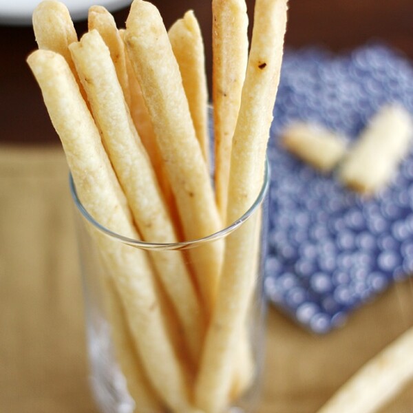 cheese straws in a glass.