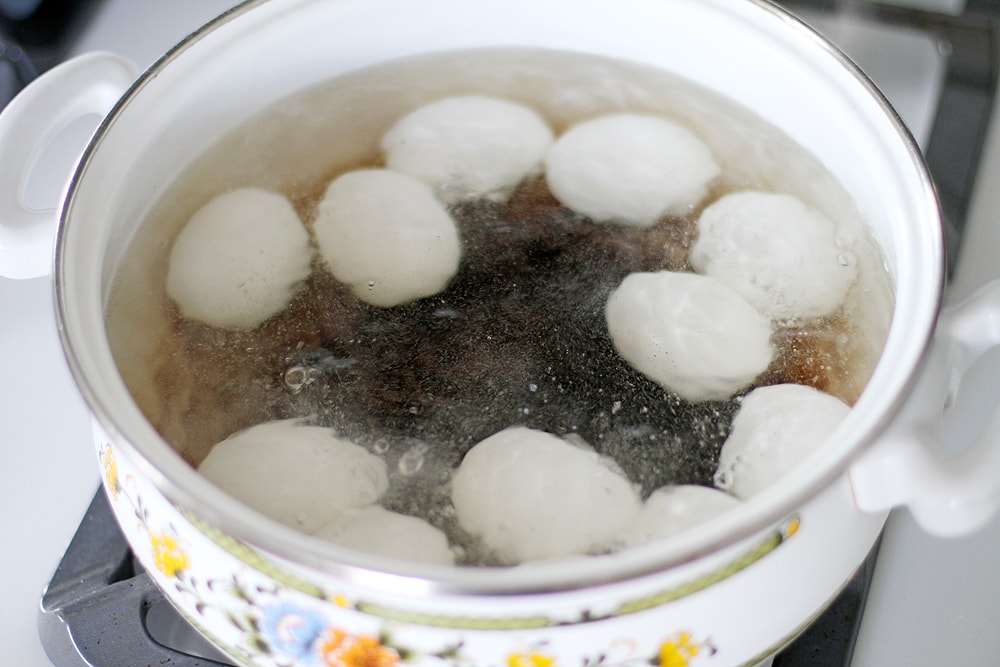 eggs boiling on stove