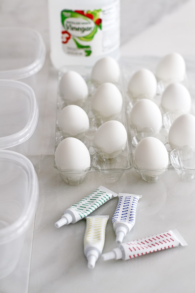 eggs and dye and vinegar on table