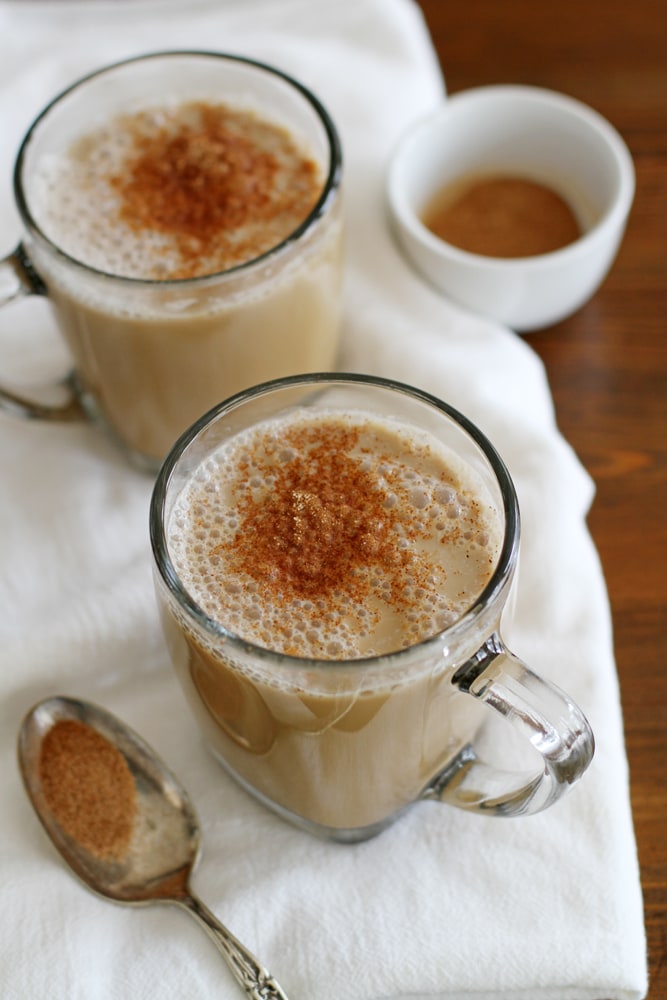 vanilla almond chai latte in glass mug