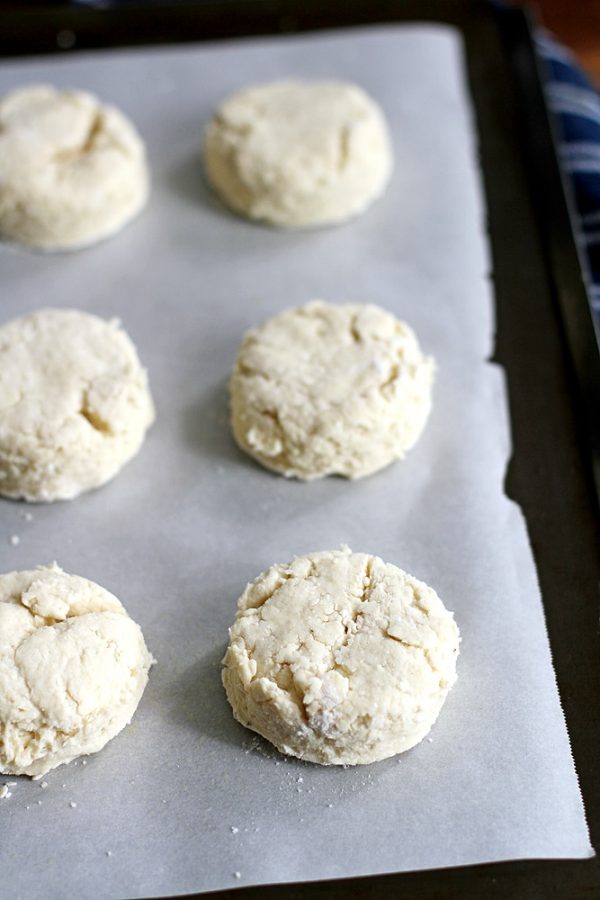 buttermilk ranch biscuit dough on parchment paper.