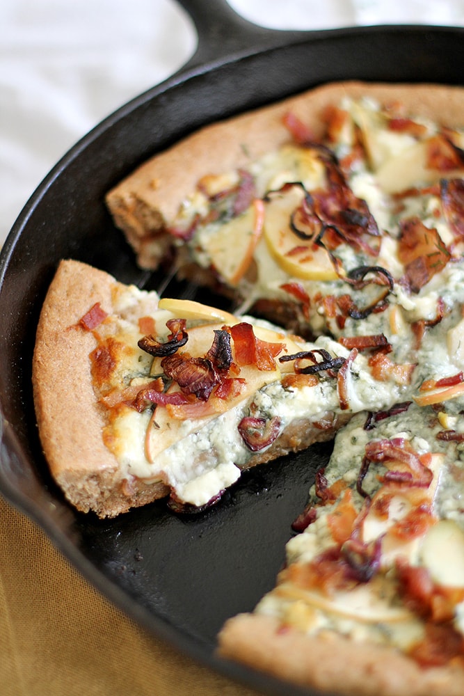 slice of bacon blue cheese pan pizza in skillet