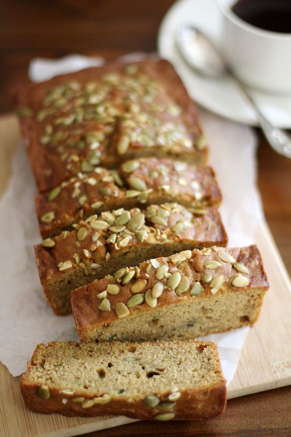 pumpkin zucchini bread sliced on cutting board