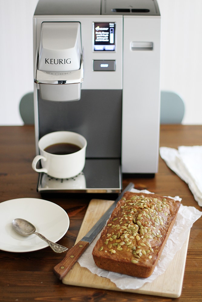 pumpkin zucchini bread next to keurig machine