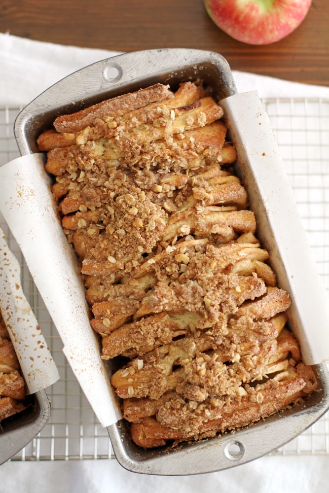 apple cinnamon streusel pull apart bread in a baking pan