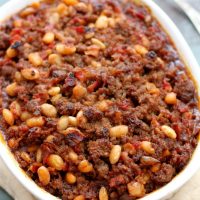mom's baked bean casserole in a baking dish