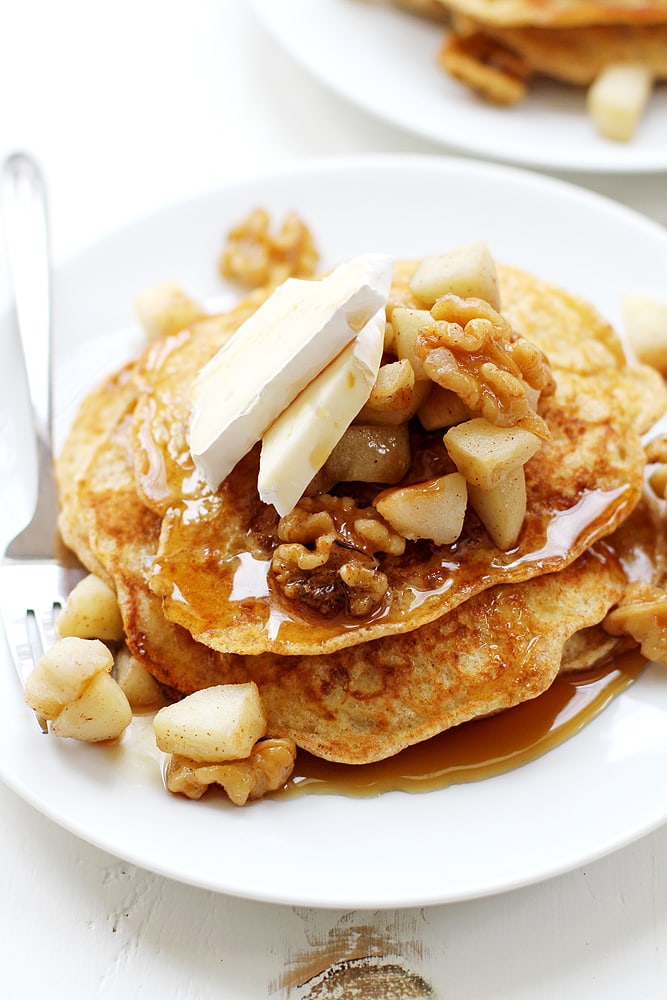 apple brie pancakes on plate with syrup