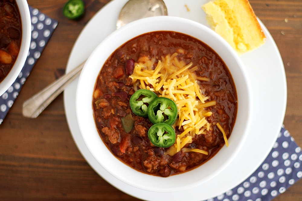 bowl of dad's beef red wine chili on a table