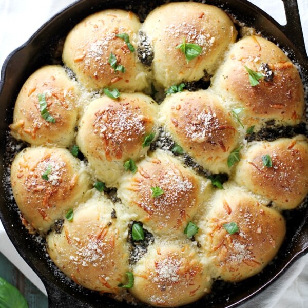 parmesan pesto rolls in skillet.