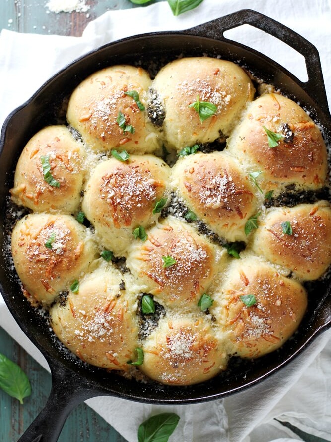 parmesan pesto rolls in skillet.