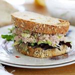 tuna salad sandwich on plate.
