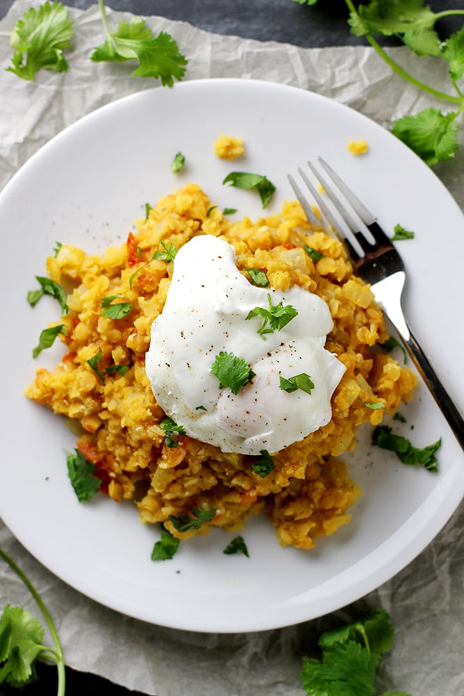 spiced lentils with poached egg on plate