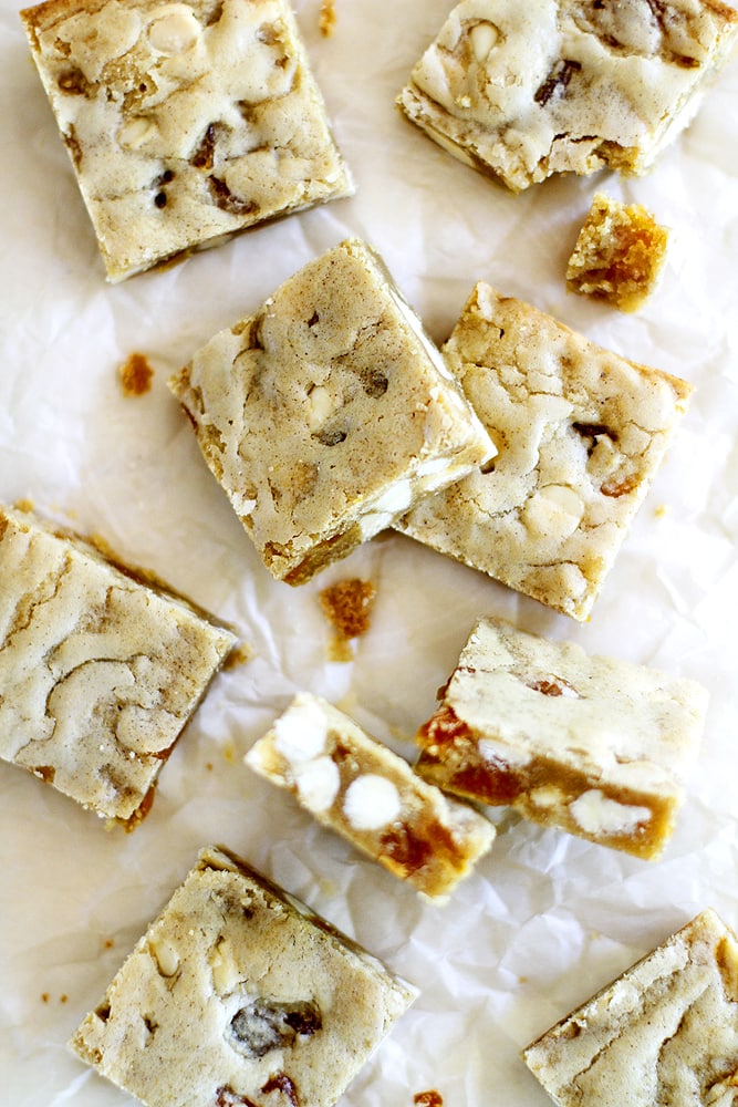 slices of apricot white chocolate blondies on parchment paper