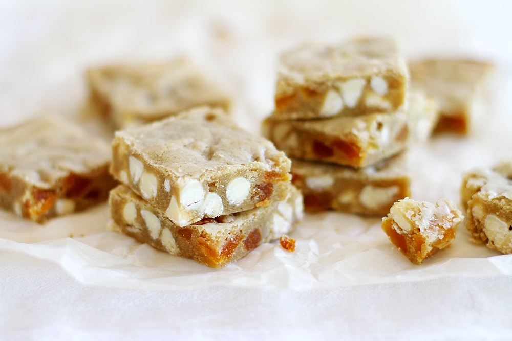 close up stacks of apricot white chocolate blondies