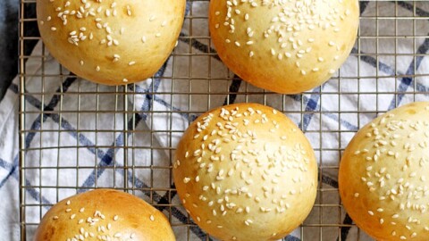 hamburger buns on a cooling rack.