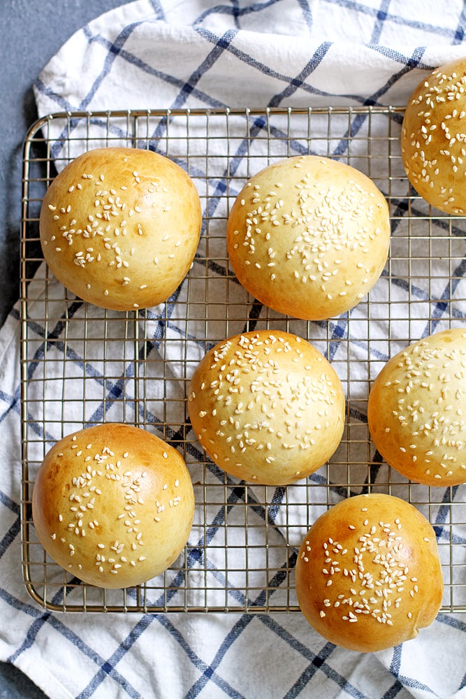 hamburger buns on a cooling rack