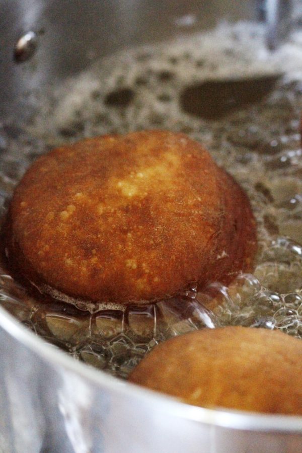 dougnuts in boiling water.