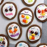 day of the dead cookies on parchment paper.