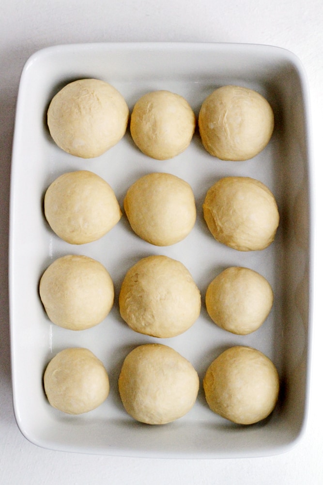 brown butter sweet potato buttermilk roll dough in baking pan