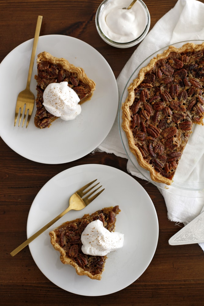 slices of pecan pumpkin pie on plates