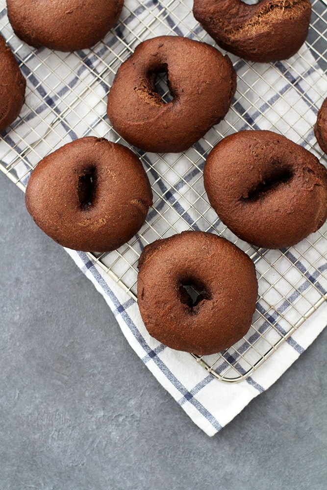 pumpernickel bagels on towel