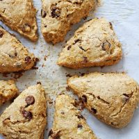 whole wheat chocolate chip banana scones on parchment paper