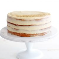 salted caramel layer cake on cake stand